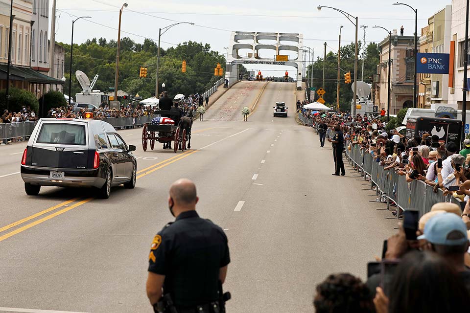 The hearse bearing John Lewis’s casket travels in a procession from Brown Chapel A.M.E. Church to the Edmund Pettus Bridge in Selma, Alabama on July 26. His body crossed that bridge for the final time, 45 years after his beating there on “Bloody Sunday” drew a national spotlight to Black people’s struggle for the right to vote.