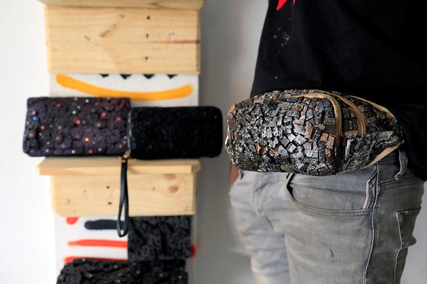 A fanny pack and women’s handbags designed by visual artist Adeyemi Emmanuel