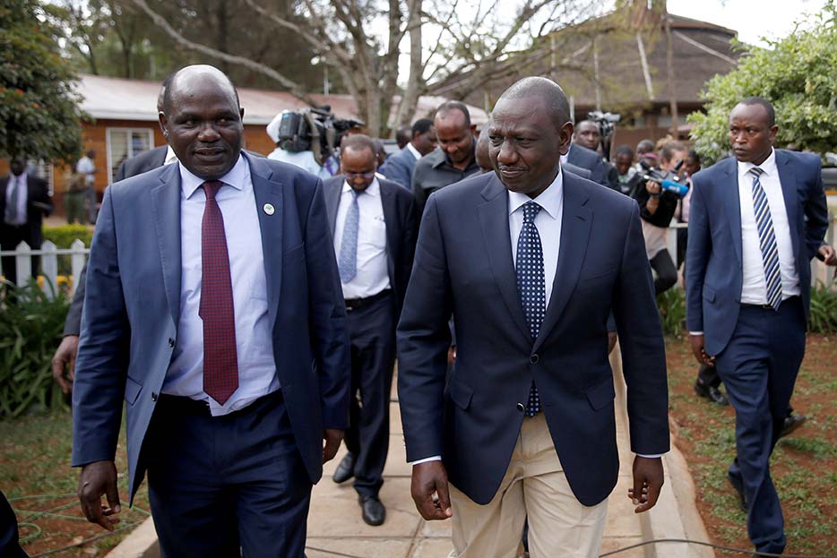 Kenyan Deputy President William Ruto walks next to Kenyan Independent Electoral and Boundaries Commission chairman Wafula Chebukati before a meeting in Nairobi, Kenya in October 2017.