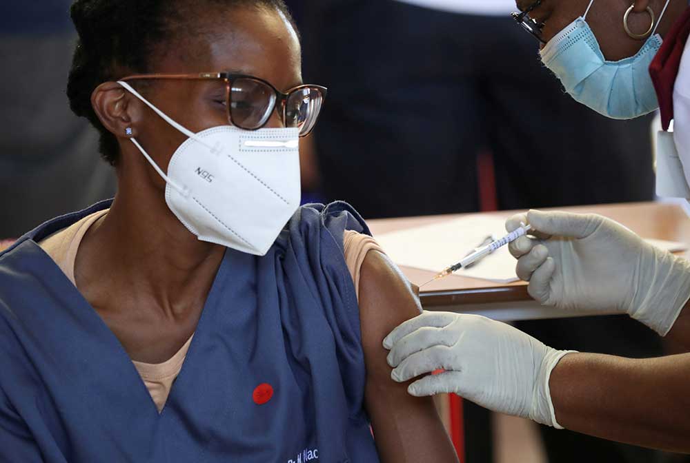 A health-care worker receives the Johnson & Johnson COVID-19 vaccination at a hospital in Soweto, South Africa in February.