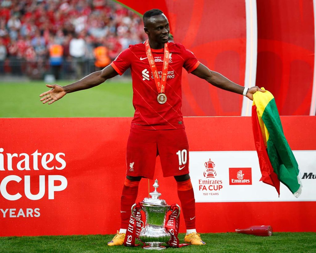 Liverpool’s Sadio Mane with the FA Cup after a 6-5 penalty shoot-out after a 0-0 draw in normal time FA Cup Final between Chelsea and Liverpool at Wembley Stadium, London on May 14 , 2022.