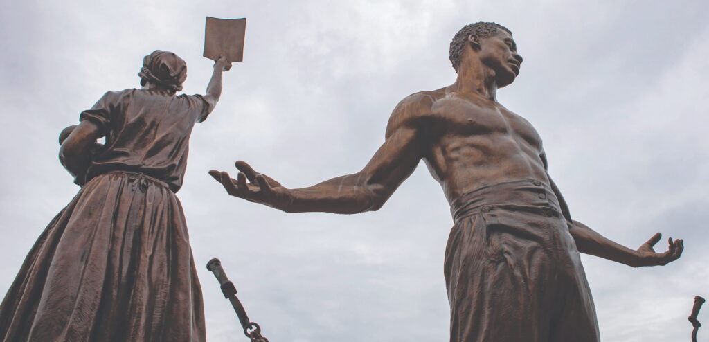 A pair of 12-foot statues representing a man, woman, and infant newly freed from slavery showing resilience in the face of horror and pain are part of the Emancipation and Freedom Monument in Richmond, Virginia. The statues, unveiled in September 2021, are on Brown’s Island, in the James River by the city’s downtown. Richmond, once the capital of the Confederacy, removed its monuments to the slaveholder-rebel state after protests in 2020.