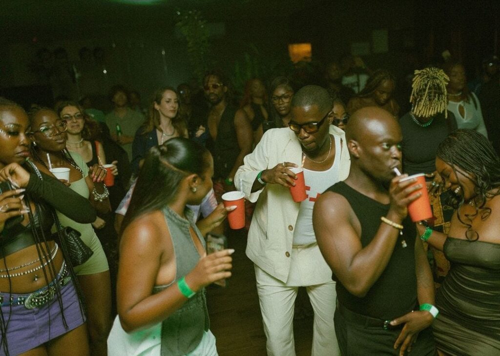 Revelers dance to Nigerian-accented house music at the monthly Group Therapy rave party in Lagos.