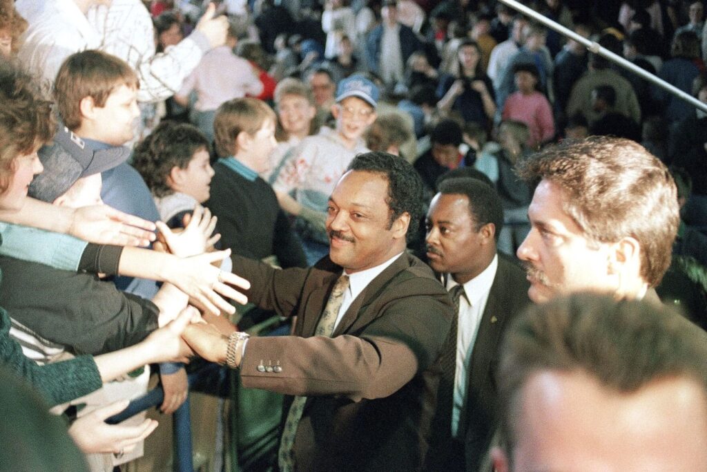 The Rev. Jesse Jackson greeting supporters while campaigning for the Democrats’ 1984 presidential nomination. He made opposition to South African apartheid a central part of his platform and, in 1988, became the first African-American candidate to win multiple state primaries.