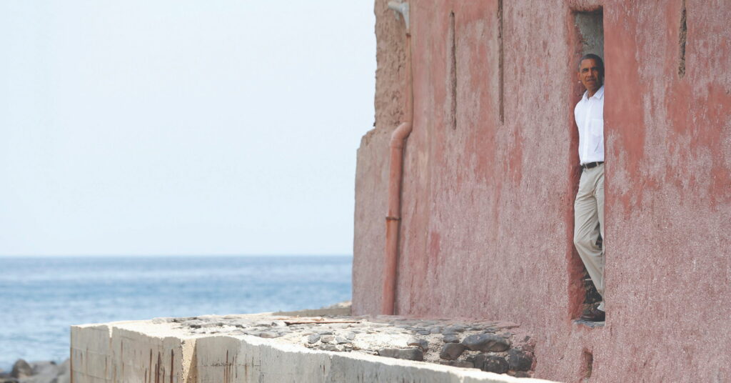 Then U.S. President Barack Obama is pictured at the “door of no return” as he visits the Maison des Esclaves, on Goree Island near Dakar, Senegal, in June 2013. The “House of Slaves,” built in the 1780s, was one of several human warehouses on the African coast where kidnapped captives were kept until they could be loaded onto slave ships – until Senegal, then a French colony, abolished slavery in 1848.