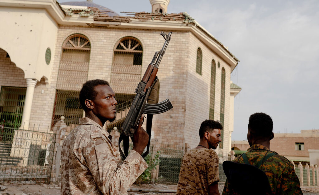 Sudanese Armed Forces soldiers patrol the streets of Khartoum, which they recaptured in March 2025, a turning point in the war.