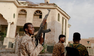 Sudanese Armed Forces soldiers patrol the streets of Khartoum, which they recaptured in March 2025, a turning point in the war.