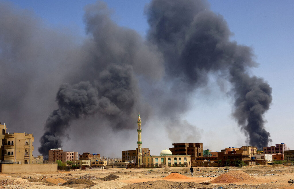 Smoke billows out of buildings bombed in Khartoum North, also known as Bahri, during clashes between the paramilitary Rapid Support Forces and the Sudanese army in May 2023.