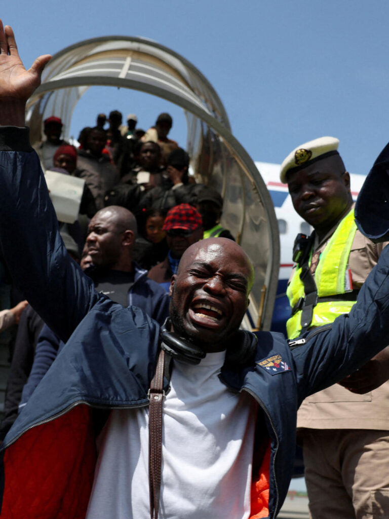A man disembarks in Lagos June 11 from a government-chartered flight repatriating 268 Nigerian citizens fleeing attacks on immigrants in South Africa. More than 1,000 Nigerian immigrants have applied for such flights. Ghana and Malawi have each brought back similar numbers, and Mozambique and Zimbabwe have also repatriated citizens.