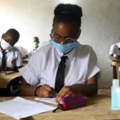 Students, wearing protective masks, study at the Merlan school of Paillet classroom during the reopening of schools, as the lockdown due to coronavirus disease is eased, in Abidjan, Cote d’Ivoire on May 25, 2020. Students, wearing protective masks, study at the Merlan school of Paillet classroom during the reopening of schools, as the lockdown due to coronavirus disease is eased, in Abidjan, Cote d’Ivoire on May 25, 2020.