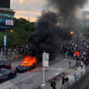 An Atlanta Police car burns as people protest near CNN Center in Atlanta, Georgia, on May 29, 2020. An Atlanta Police car burns as people protest near CNN Center in Atlanta, Georgia, on May 29, 2020.