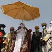 Emir of Jiwa, Alhaji Idris Musa, talks on a microphone. Emir of Jiwa, Alhaji Idris Musa, talks on a microphone.