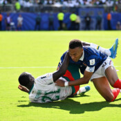 Senegal midfielder Habib Diarra, left, and French star striker Kylian Mbappé collide during a Group I match at New York/New Jersey Stadium in East Rutherford, New Jersey, on June 16. France won 3-1, as Mbappé scored two goals. Senegal midfielder Habib Diarra, left, and French star striker Kylian Mbappé collide during a Group I match at New York/New Jersey Stadium in East Rutherford, New Jersey, on June 16. France won 3-1, as Mbappé scored two goals.